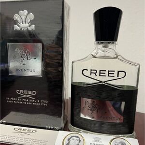 Creed Aventus Fragrance with Black and Silver Accents